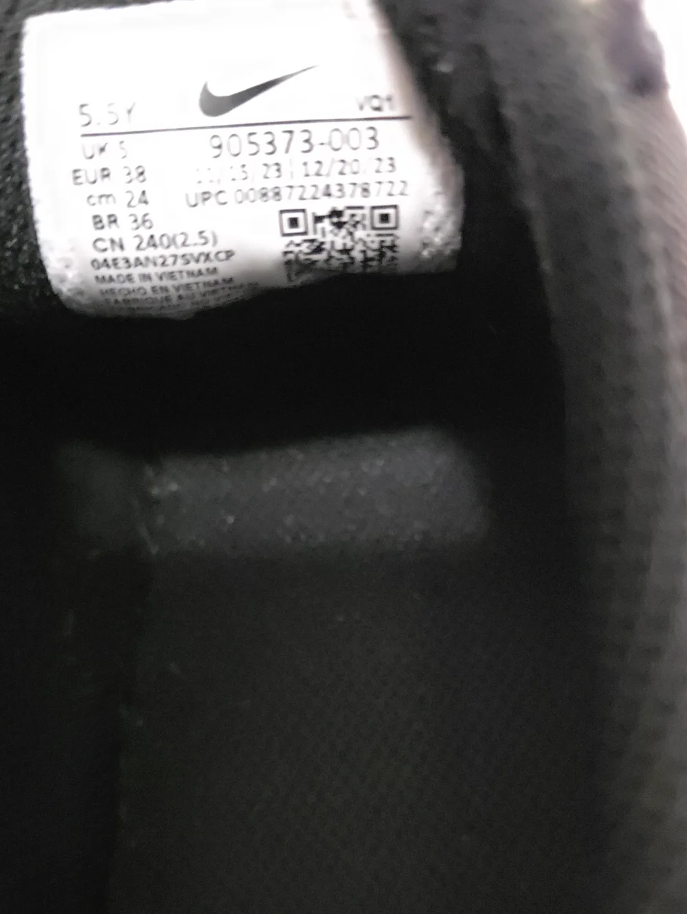 Nike Black Low-Top Sneakers with White Swoosh